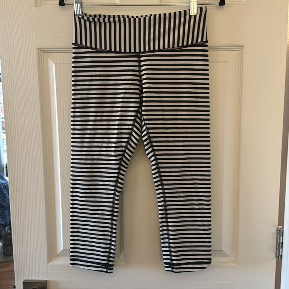 Lululemon black and off-white striped crops. Size 6.